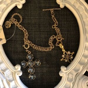 Gold colored bracelet with detachable charms.🧡🌼